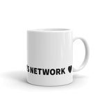 White mug with "The Women's Network" on bottom print.